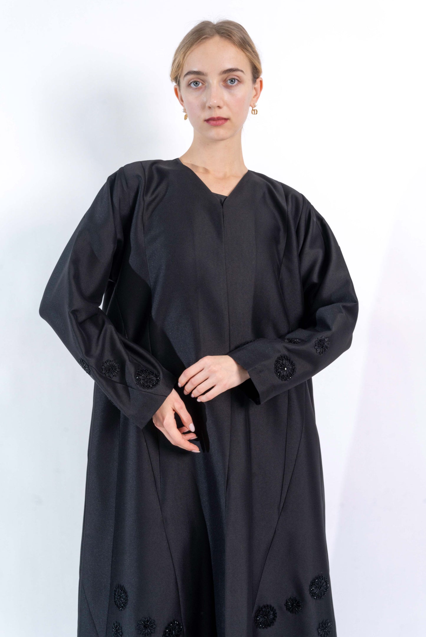 Black Abaya with floral embellishment.