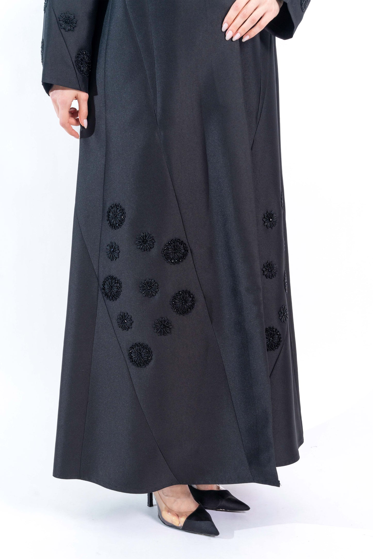 Black Abaya with floral embellishment.