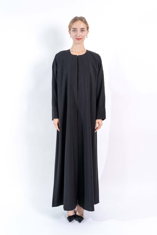 Black Abaya with embroidered pattern.